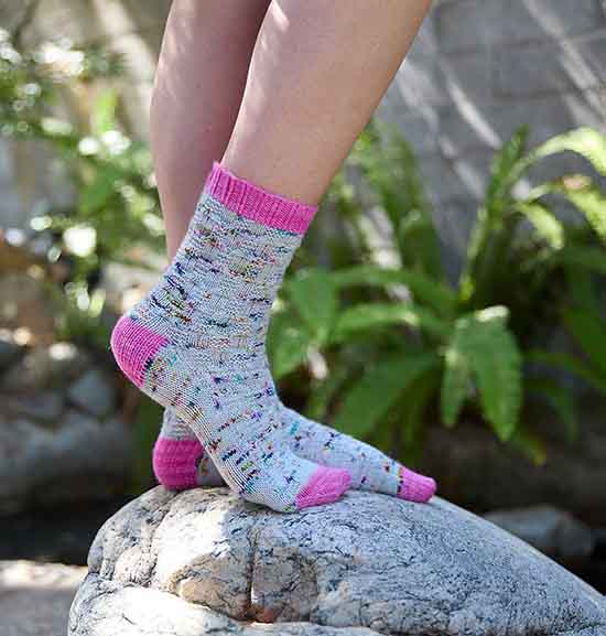Whale of a Tail socks - texture along the body with bright pink accents at the heel, toe and cuff.