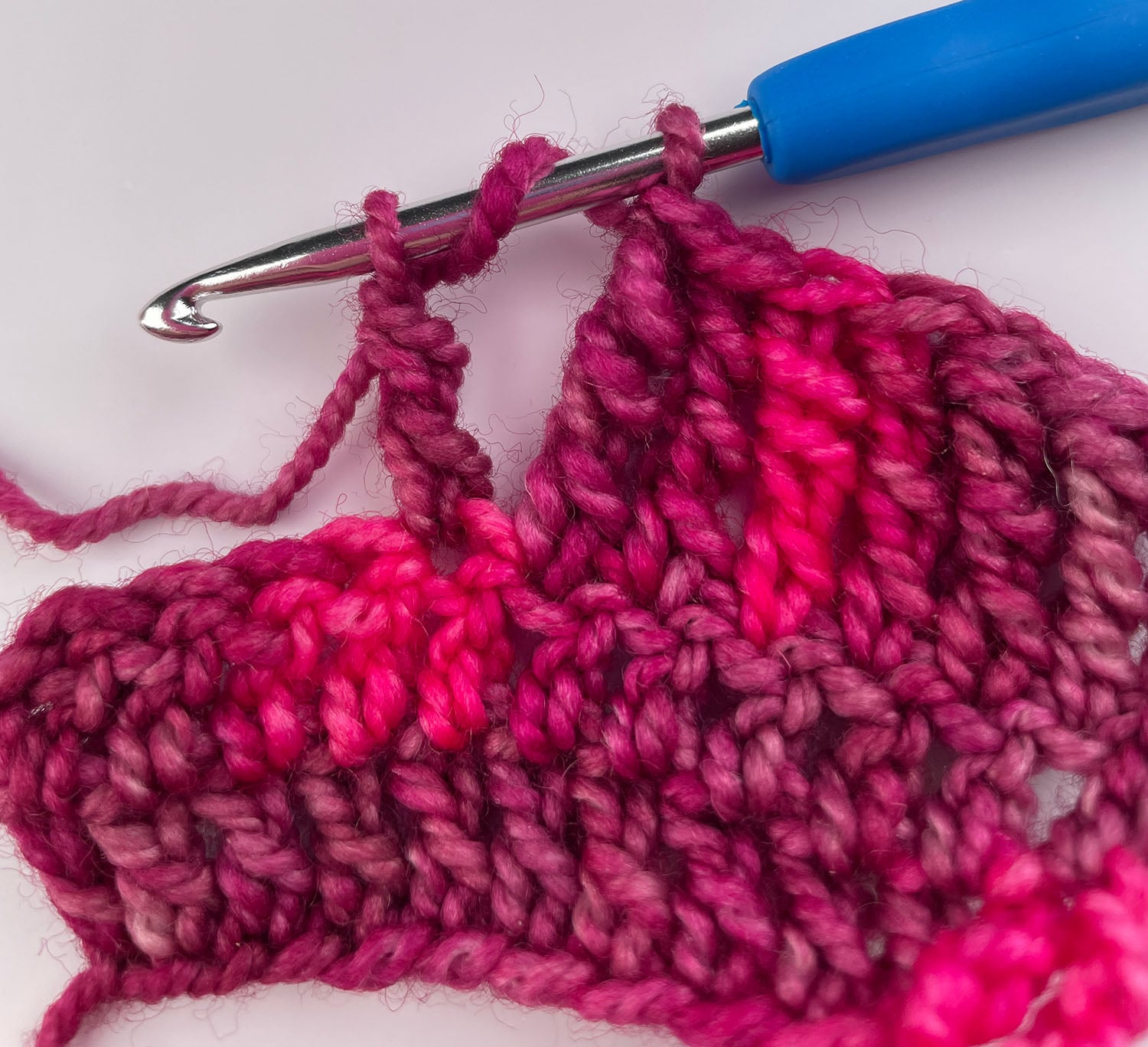 The third pull-through of a double treble crochet.