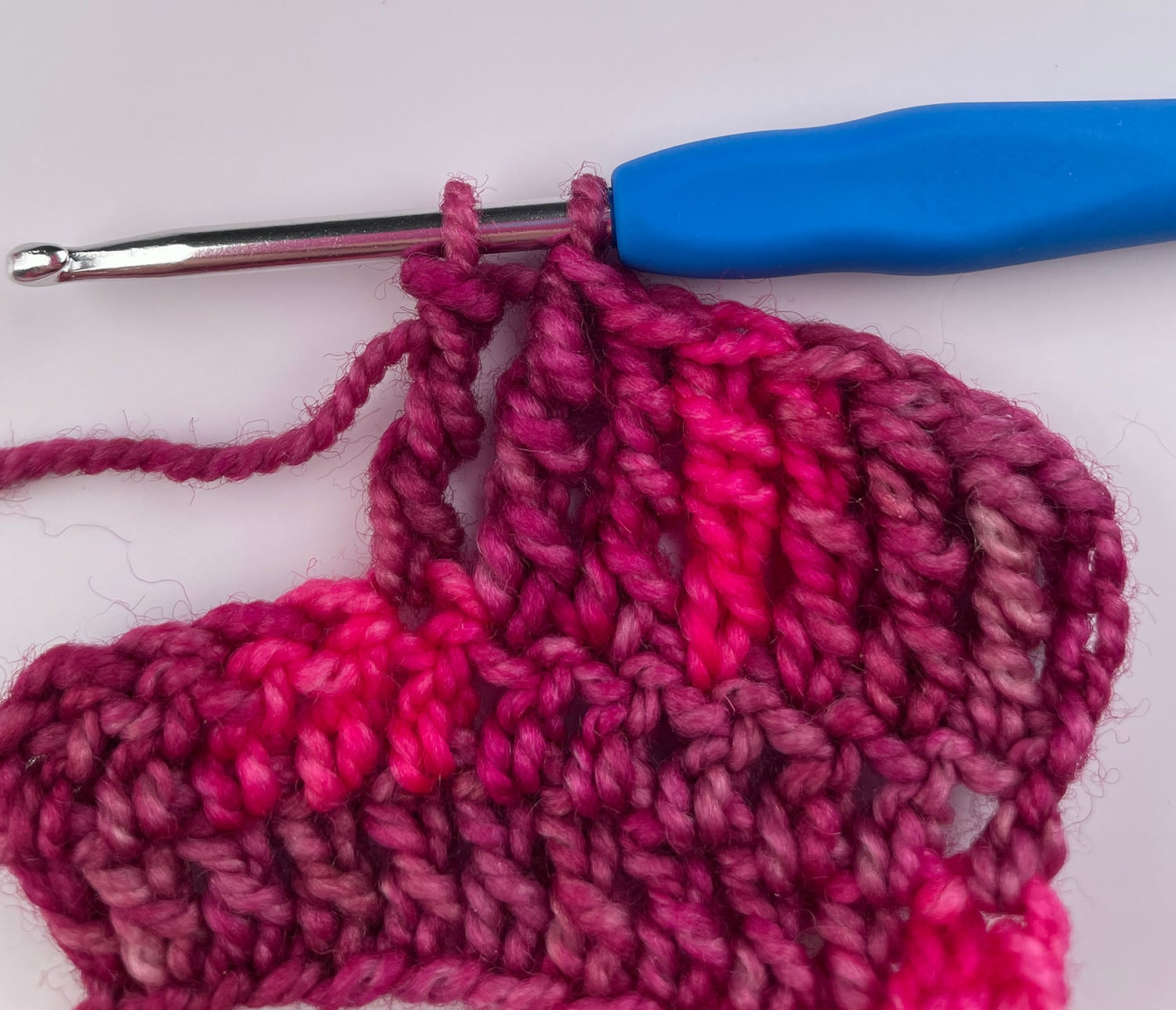 The fourth pull-through of a double treble crochet.